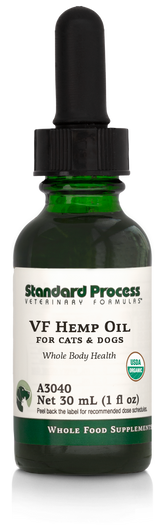Image of a bottle of liquid VF Hemp Oil from Standard Process Veterinary Formulas next to a dropper that is included with the bottle.